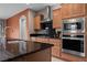 Kitchen with granite countertop, stainless steel appliances, and wood cabinets at 906 Majestic Vw, Mesquite, NV 89034