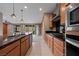Kitchen with granite countertop, stainless steel appliances, and wood cabinets at 906 Majestic Vw, Mesquite, NV 89034