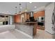 Kitchen with granite countertop, stainless steel appliances, and wood cabinets at 906 Majestic Vw, Mesquite, NV 89034