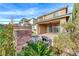 Private backyard featuring an outdoor seating area with mature landscaping at 12397 Foxtail Run Ave, Las Vegas, NV 89138