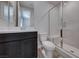 This full bathroom features a glass shower with a built-in seat at 12397 Foxtail Run Ave, Las Vegas, NV 89138
