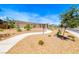Community park pathway with desert landscaping and benches at 12397 Foxtail Run Ave, Las Vegas, NV 89138