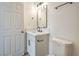 Bathroom vanity features white countertop, black fixtures, and cabinet at 1945 Margarita Ave, Henderson, NV 89011