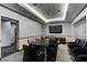 Modern conference room with large table, comfortable seating and a TV at 200 W Sahara Ave # 3009, Las Vegas, NV 89102