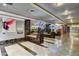Lobby showcases modern lighting, unique art, and marble floors at 200 W Sahara Ave # 3009, Las Vegas, NV 89102