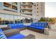 Comfortable lounge area with blue couches and scenic views at 200 W Sahara Ave # 3009, Las Vegas, NV 89102