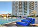Upscale pool area with lounge seating, cabanas, and surrounding landscaping at 200 W Sahara Ave # 3009, Las Vegas, NV 89102