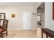 Bright and airy entryway featuring neutral tones, tile flooring, and an open view to the living spaces at 2386 Amana Dr, Henderson, NV 89044