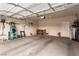 Spacious two-car garage with workbench and storage; ready for your projects and organization at 2386 Amana Dr, Henderson, NV 89044