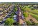 Stunning aerial view of the neighborhood next to the golf course, showcasing the well-maintained streets at 2553 Showcase Dr, Las Vegas, NV 89134