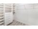 Spacious walk-in closet with built-in shelving and drawers for optimal storage solutions at 2553 Showcase Dr, Las Vegas, NV 89134