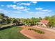 Beautiful view of the well-manicured golf course and landscaping surrounding a home in a golf community at 2553 Showcase Dr, Las Vegas, NV 89134