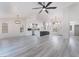 Open concept living room with a view of the kitchen and lots of natural light at 2553 Showcase Dr, Las Vegas, NV 89134