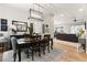 Open dining area with hardwood floors and ample natural light connects to the living space at 2768 Tyndrum Ave, Henderson, NV 89044