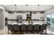 Bright kitchen with a large island, modern appliances, and bar stool seating at 2768 Tyndrum Ave, Henderson, NV 89044