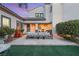 Charming outdoor living space with comfortable seating, offering a tranquil area for relaxation and socializing at 2768 Tyndrum Ave, Henderson, NV 89044