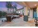 Cozy outdoor patio with comfortable seating and a welcoming atmosphere, ideal for relaxation and entertaining at 2768 Tyndrum Ave, Henderson, NV 89044