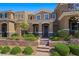 Traditional two-story home with a welcoming front porch and neat landscaping at 2816 Turnstone Ridge St, Henderson, NV 89044