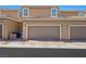 Exterior elevation of a multi Gathering home with garages at 2816 Turnstone Ridge St, Henderson, NV 89044