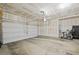 Two car garage interior with unfinished drywall at 2816 Turnstone Ridge St, Henderson, NV 89044