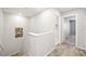 Hallway with wood-look flooring leading to other rooms at 2816 Turnstone Ridge St, Henderson, NV 89044