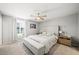 Cozy main bedroom with a plush bed, soft carpeting, and ample natural light at 2816 Turnstone Ridge St, Henderson, NV 89044