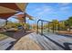 Playground area with swings and sun shades at 2816 Turnstone Ridge St, Henderson, NV 89044
