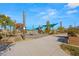 Community playground area provides shade and a variety of different equipment to play on at 2816 Turnstone Ridge St, Henderson, NV 89044