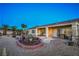 Charming backyard featuring gravel landscaping and covered patio, perfect for outdoor relaxation at 3002 Hickory Valley Rd, Henderson, NV 89052