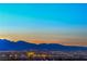 Spectacular city lights and mountain views visible from this stunning property, a true desert oasis at 3002 Hickory Valley Rd, Henderson, NV 89052