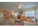 Open-concept living area featuring a cozy living room and kitchen with lots of natural light at 3002 Hickory Valley Rd, Henderson, NV 89052