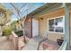 Inviting entryway showcasing desert landscaping and a modern, secure front door at 317 E Van Wagenen St, Henderson, NV 89015
