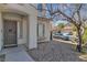 Inviting front entrance featuring a neutral color scheme and low-maintenance desert landscaping at 3215 Lubec Valley Ln, Henderson, NV 89074