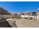 Charming backyard featuring a stone patio, a pergola with seating, and a small grassy area at 3313 Jamaica Princess Pl # 3, North Las Vegas, NV 89084