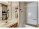 Inviting bathroom featuring shower and tub combo, vanity, and modern fixtures at 3313 Jamaica Princess Pl # 3, North Las Vegas, NV 89084
