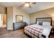 Spacious bedroom with a queen bed, carpeted floors, and warm neutral wall color at 3313 Jamaica Princess Pl # 3, North Las Vegas, NV 89084