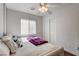 Comfortable bedroom with ample natural light, carpet flooring, and large closet at 3313 Jamaica Princess Pl # 3, North Las Vegas, NV 89084