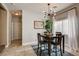 Cozy dining area with modern lighting and a view of the hallway at 3313 Jamaica Princess Pl # 3, North Las Vegas, NV 89084