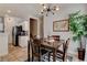 Dining area with a stylish light fixture and a view of the kitchen at 3313 Jamaica Princess Pl # 3, North Las Vegas, NV 89084