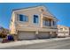 Inviting two-story townhome featuring a three-car garage and charming balcony at 3313 Jamaica Princess Pl # 3, North Las Vegas, NV 89084