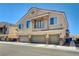 Inviting two-story townhome featuring a three-car garage and charming balcony at 3313 Jamaica Princess Pl # 3, North Las Vegas, NV 89084