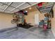 Spacious garage with overhead storage racks, bike storage, and room for a home gym at 3313 Jamaica Princess Pl # 3, North Las Vegas, NV 89084