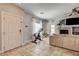 Open-concept living room with fireplace and backyard access to relax or entertain at 3313 Jamaica Princess Pl # 3, North Las Vegas, NV 89084
