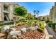 Beautifully landscaped grounds with mature trees, rocks and walking paths create a welcoming and serene community environment at 3550 Bay Sands Dr # 3020, Laughlin, NV 89029