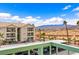 Condo building showcasing parking, views of mountains and desert landscape from a balcony at 3550 Bay Sands Dr # 3020, Laughlin, NV 89029