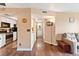 View of a well-lit living area flowing seamlessly into a modern kitchen and a hallway leading to the bathroom at 3550 Bay Sands Dr # 3020, Laughlin, NV 89029