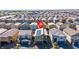 Aerial view of home with solar panels amid a vibrant, bustling neighborhood at 3807 Andorian Ave, North Las Vegas, NV 89084