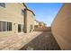 A spacious backyard featuring a small patio, ideal for outdoor relaxation and entertaining at 3807 Andorian Ave, North Las Vegas, NV 89084