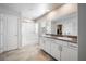 Bathroom featuring double sinks, granite countertops, and tiled flooring at 3807 Andorian Ave, North Las Vegas, NV 89084