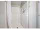 Clean bathroom showcasing bright white shower with adjustable showerhead and shower curtain at 3807 Andorian Ave, North Las Vegas, NV 89084